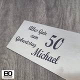 Maurerkelle mit verschiedenen Sprüchen